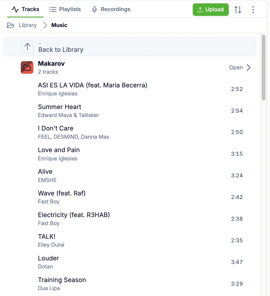 The media library drilled into the Music folder, showing a breadcrumb back to the library root, a nested sub-folder and a list of tracks with artwork, artist and duration.